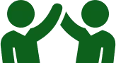 Two green silhouettes high-fiving each other, symbolizing teamwork and success.